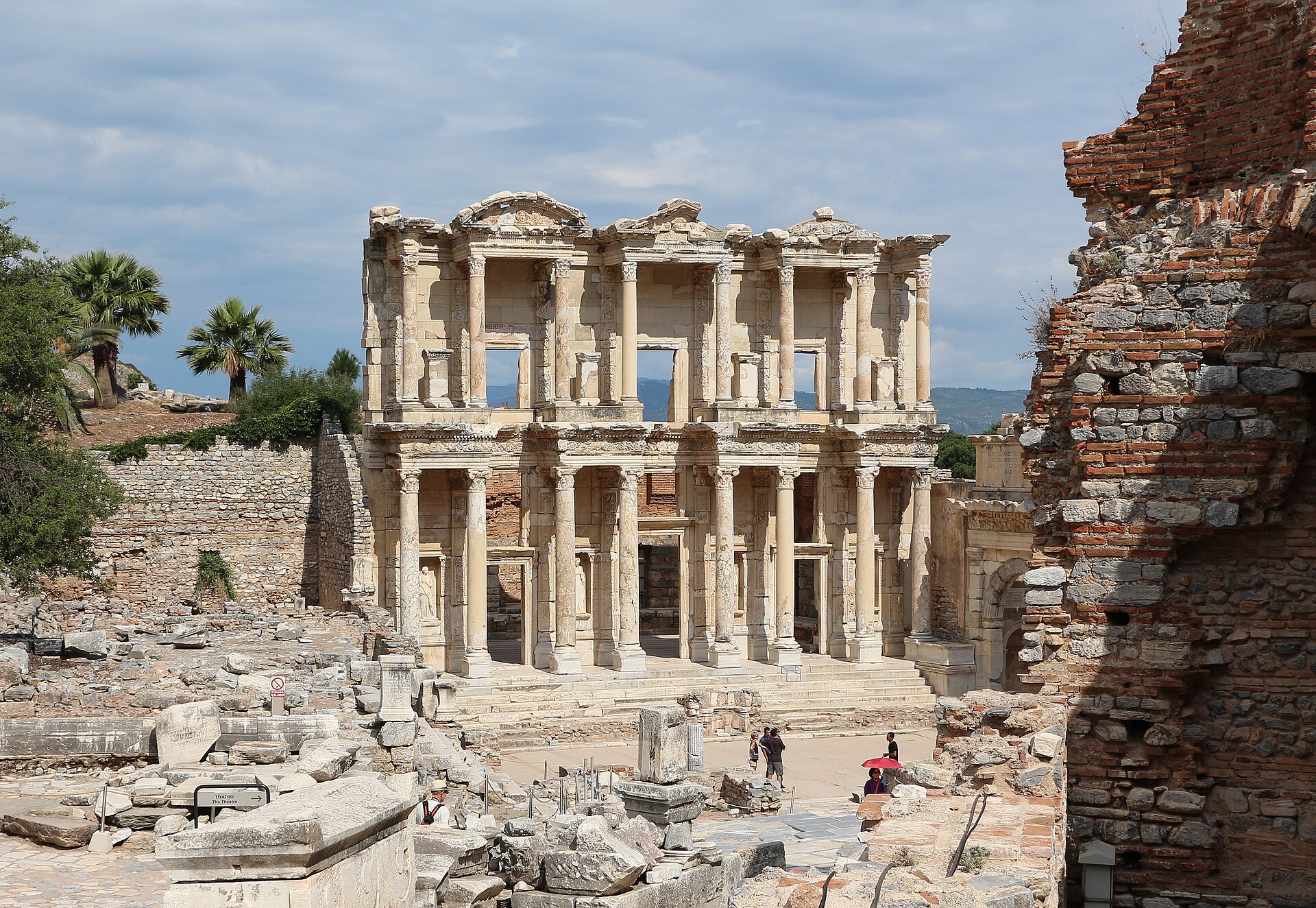 The restored facade of the Library of Celsus among the ruins of Ephesus