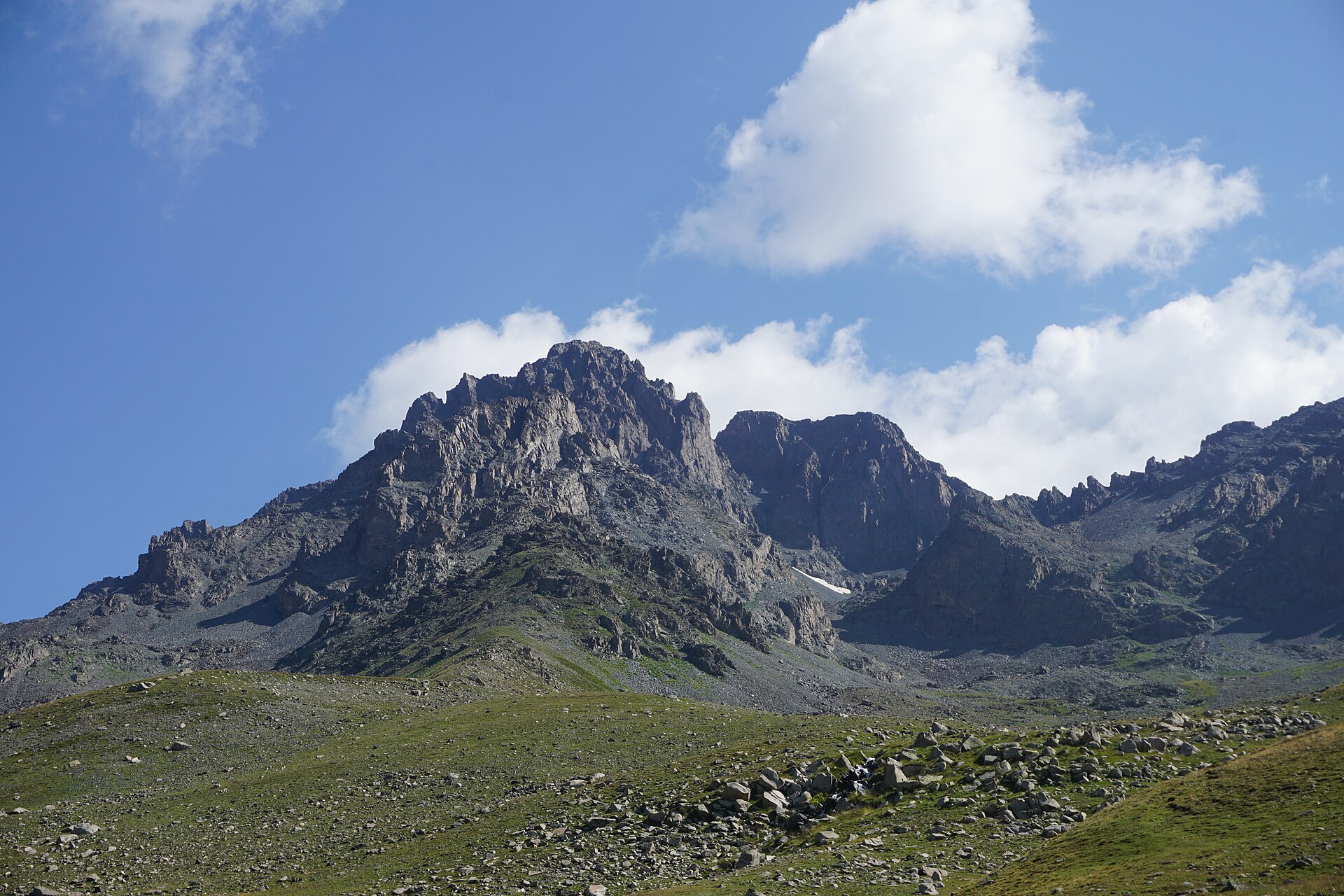 Rocky summit and green slopes in Kaçkar Mountains National Park