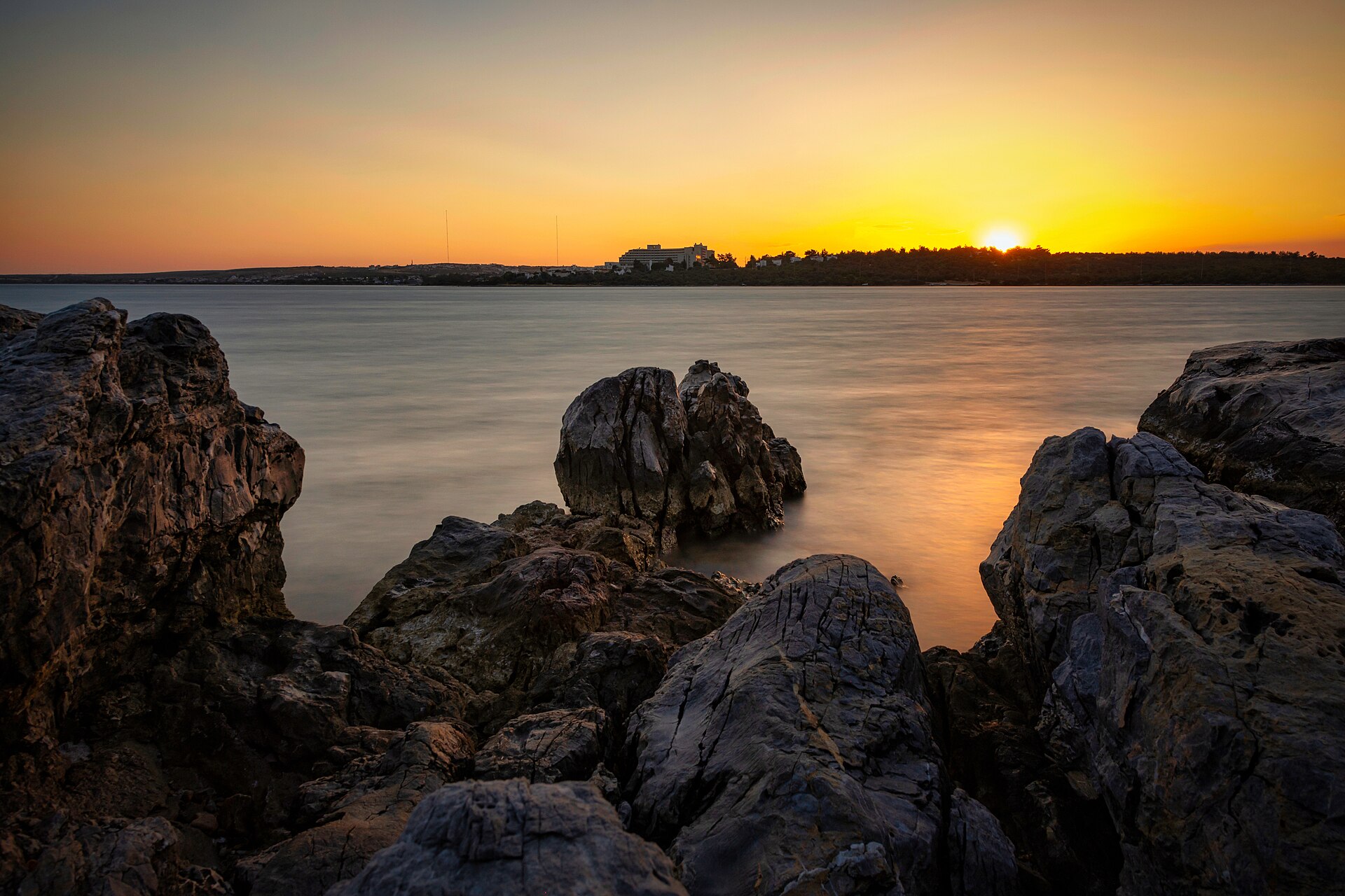 Sunset over the Aegean shoreline at Saplı Island in Akbük Bay, Didim